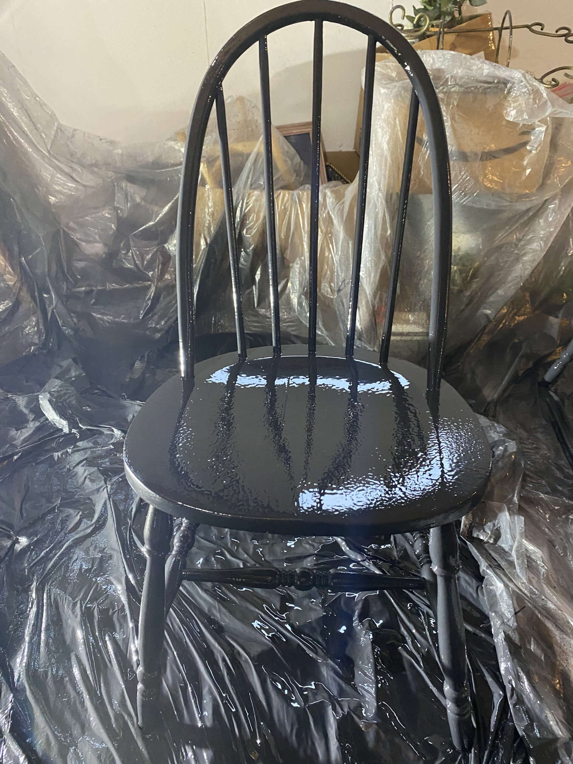 paint sprayer painting chairs